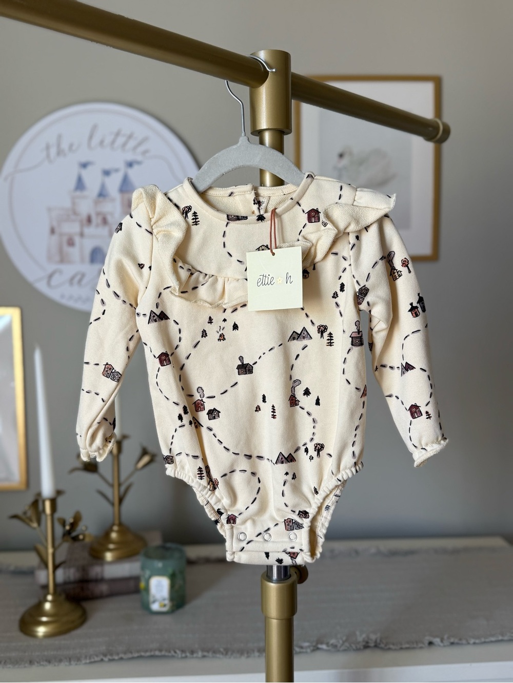 Elle + Rae Cream Ruffle-Trim Baby One-Piece Bodysuit